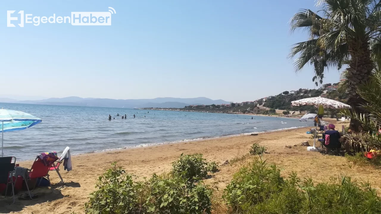 İzmir'in Sakin ve Huzurlu Plajı: Sığ Denizi ve İpek Gibi Kumlarıyla Göz Kamaştırıyor